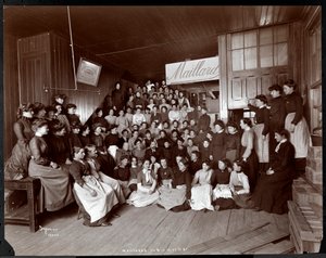 Group portrait of female employees with one man, presumably Mr. Maillard, at Maillard